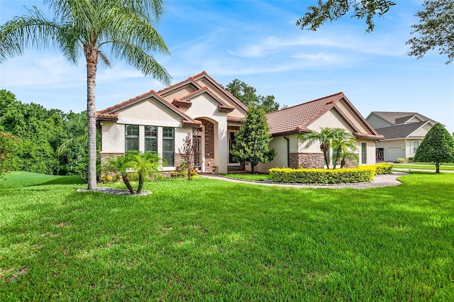 view of front of house with a front lawn