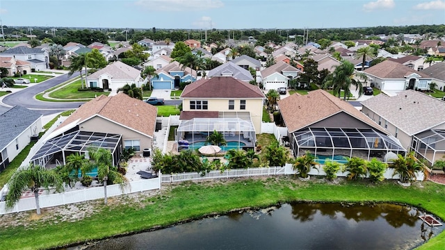 drone / aerial view with a water view