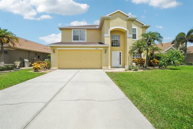 view of front of property with a garage and a front yard