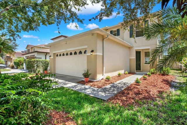 view of front of property with a garage