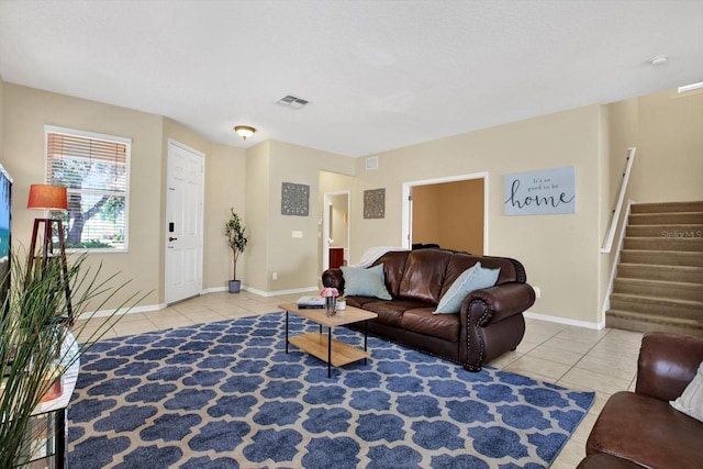 living room featuring light tile patterned floors