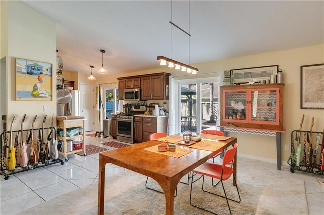 dining room featuring light tile patterned floors