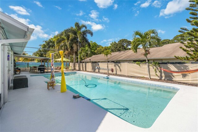 view of pool featuring a patio