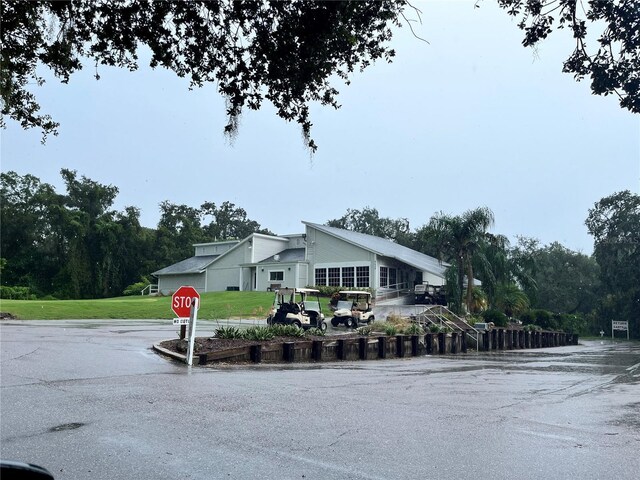 35226 Janine Dr, Zephyrhills, FL 33541 - mid-century inspired home with a front yard