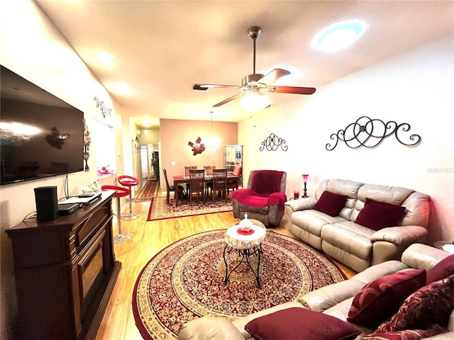 35226 Janine Dr, Zephyrhills, FL 33541 - living room with light wood-type flooring and a ceiling fan