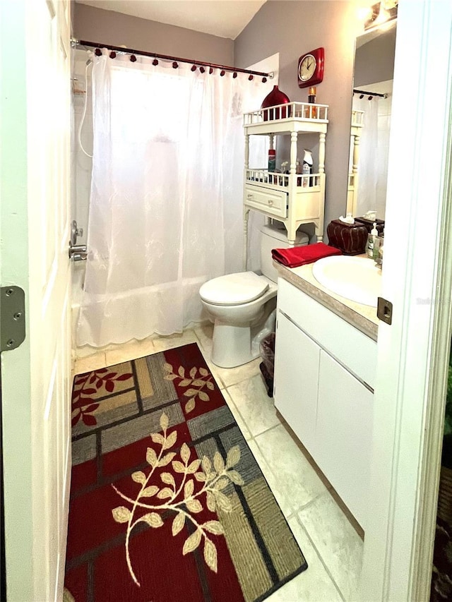 35226 Janine Dr, Zephyrhills, FL 33541 - bathroom with shower / tub combo, vanity, toilet, and tile patterned flooring