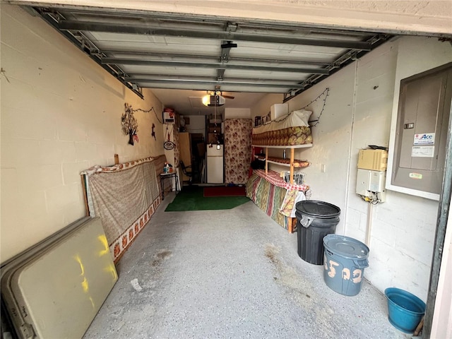 35226 Janine Dr, Zephyrhills, FL 33541 - garage with electric panel and a garage door opener