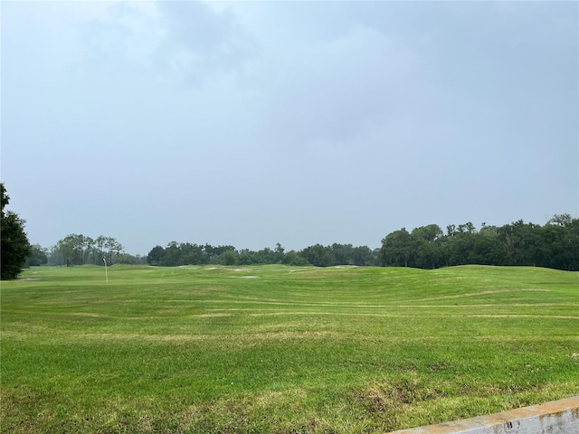 35226 Janine Dr, Zephyrhills, FL 33541 - surrounding community featuring a yard and view of golf course