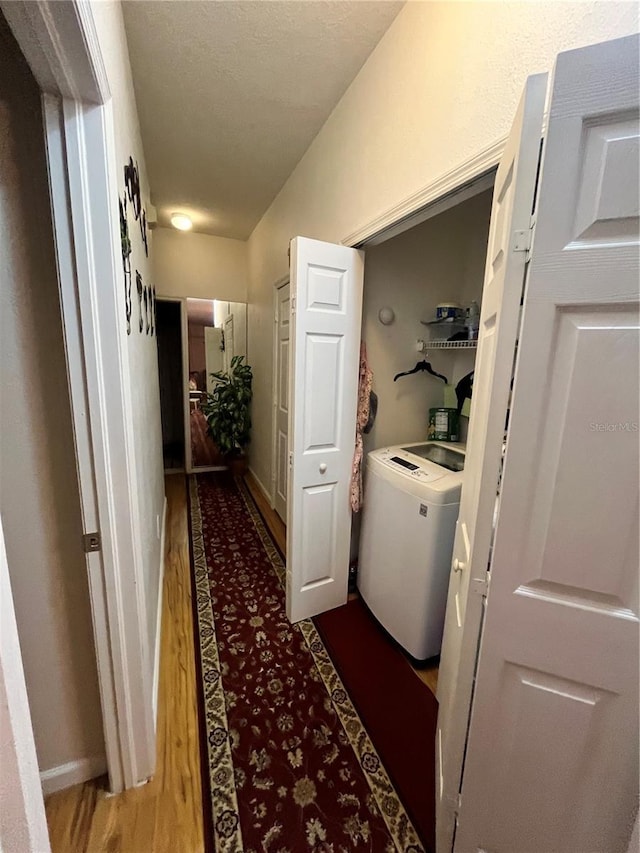 35226 Janine Dr, Zephyrhills, FL 33541 - washroom featuring wood finished floors