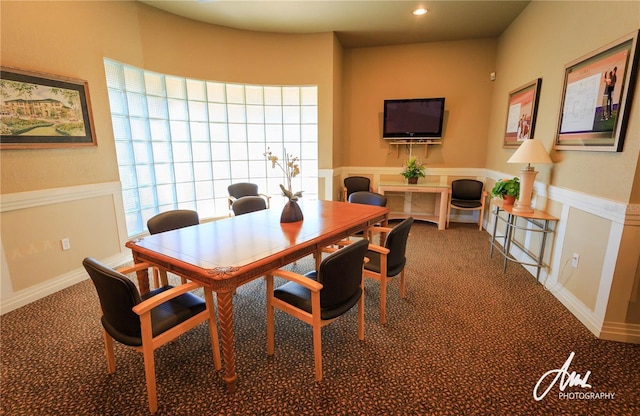 view of carpeted dining area