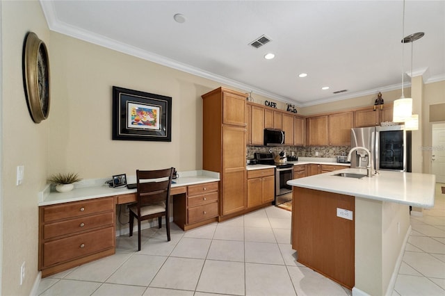 kitchen with decorative backsplash, appliances with stainless steel finishes, crown molding, sink, and decorative light fixtures