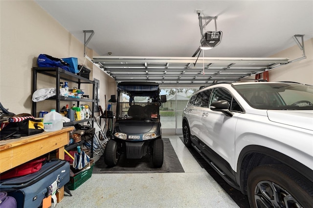 garage featuring a garage door opener