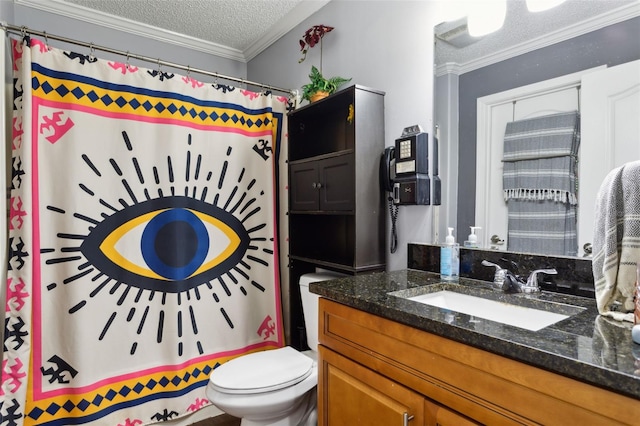 bathroom with vanity, a textured ceiling, toilet, and ornamental molding