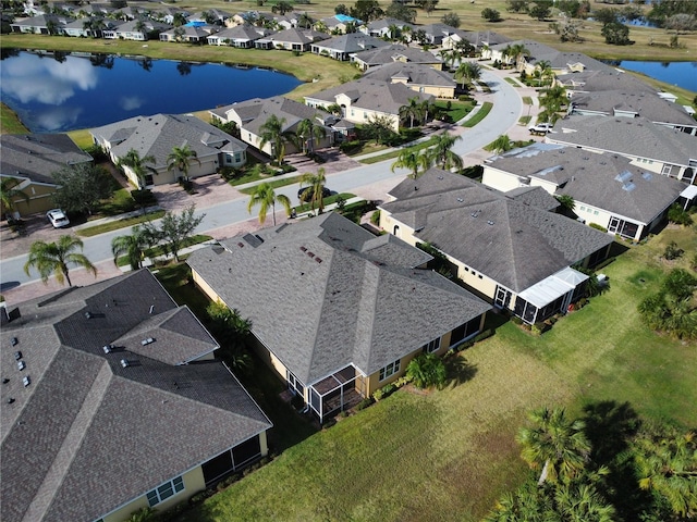 drone / aerial view featuring a water view