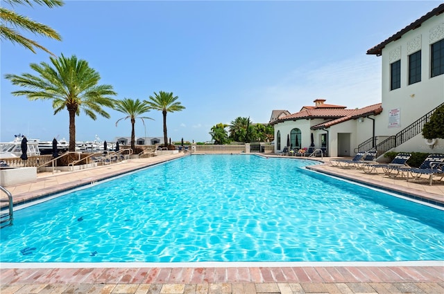 view of swimming pool with a patio area