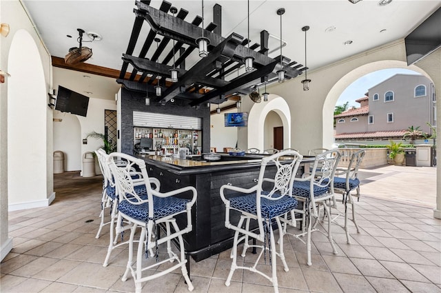 tiled dining area with bar