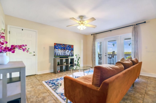 living room with tile patterned flooring and ceiling fan