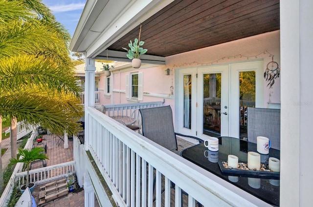 balcony featuring french doors