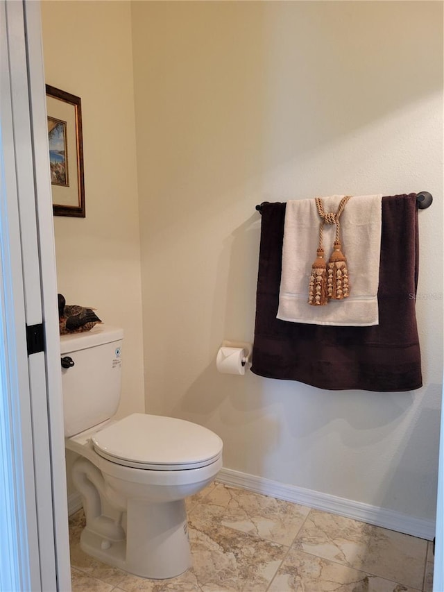 bathroom featuring toilet