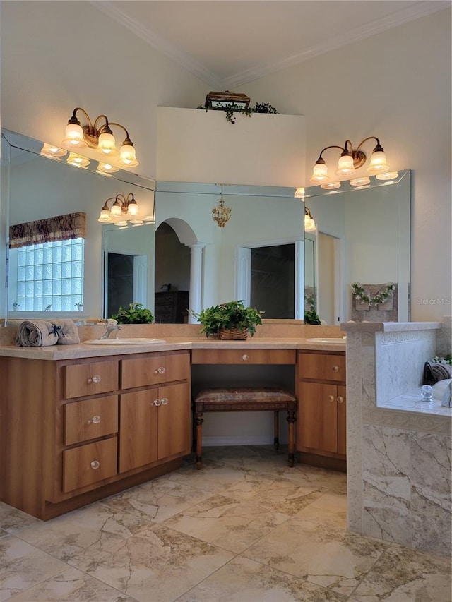 bathroom with vanity and crown molding