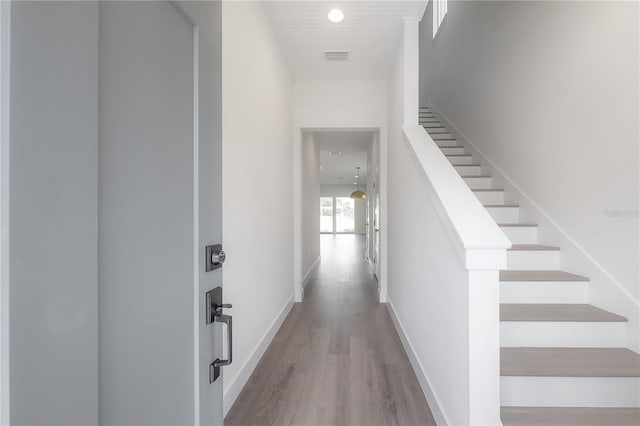 5530 N 9th St Unit 5, Tampa, FL 33604 - stairway with wood finished floors, baseboards, and recessed lighting