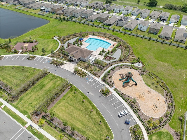 drone / aerial view with a water view