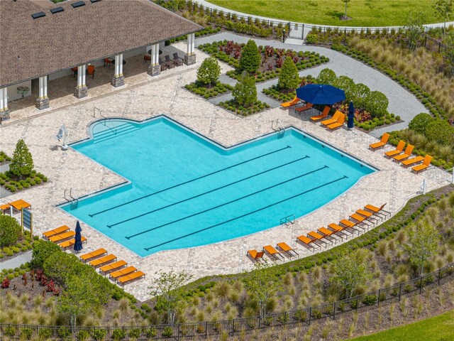 view of swimming pool with a gazebo and a patio area