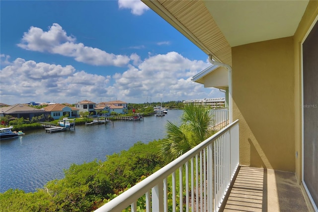 balcony featuring a water view