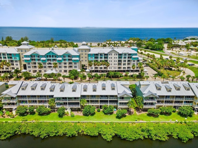 drone / aerial view with a water view