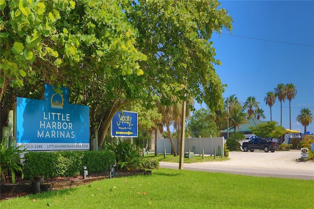 view of community featuring a yard