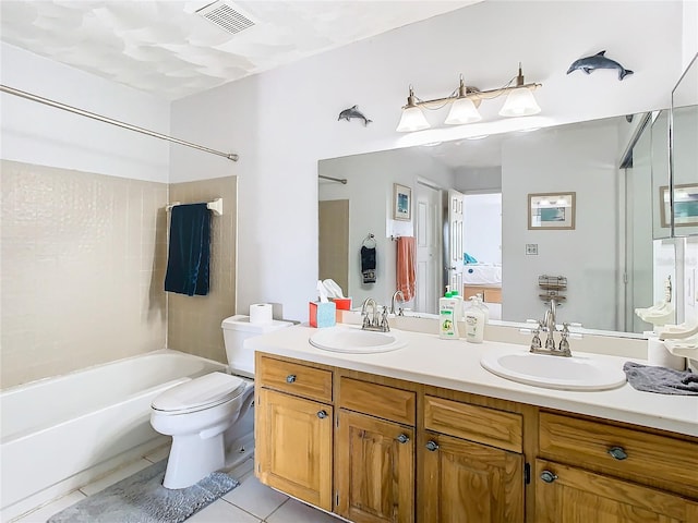 full bathroom with tile patterned floors,  shower combination, toilet, and double sink vanity