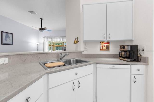 kitchen with ceiling fan, white cabinets, sink, and white dishwasher