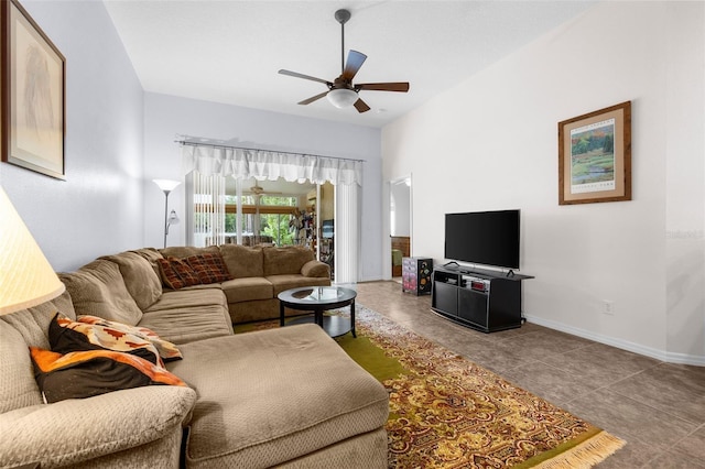 tiled living room with ceiling fan