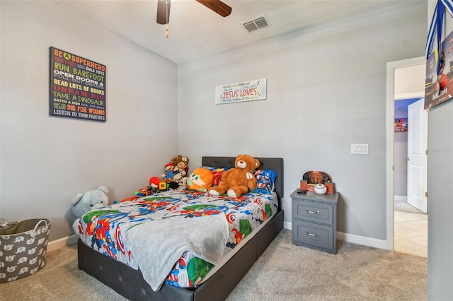bedroom featuring carpet floors, baseboards, ceiling fan, and visible vents