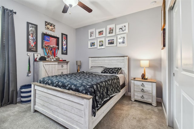 carpeted bedroom with ceiling fan