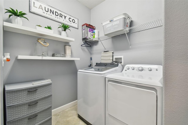 laundry room featuring independent washer and dryer and laundry area