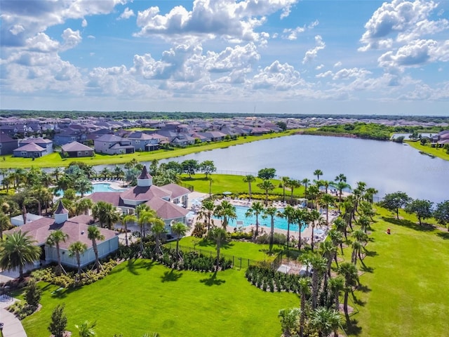 aerial view featuring a water view and a residential view