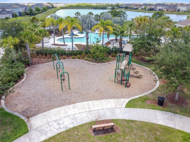 view of property's community featuring a water view and playground community