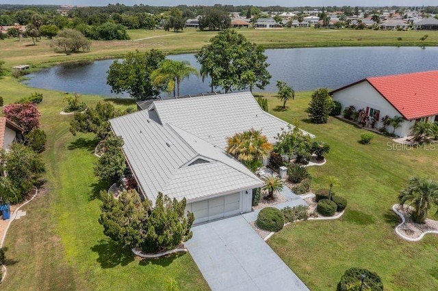 drone / aerial view with a water view