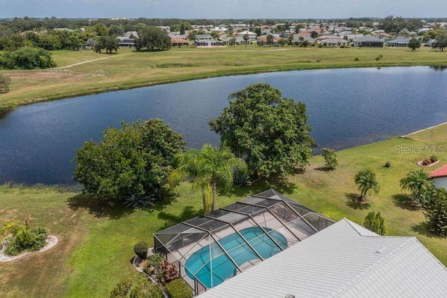 birds eye view of property featuring a water view