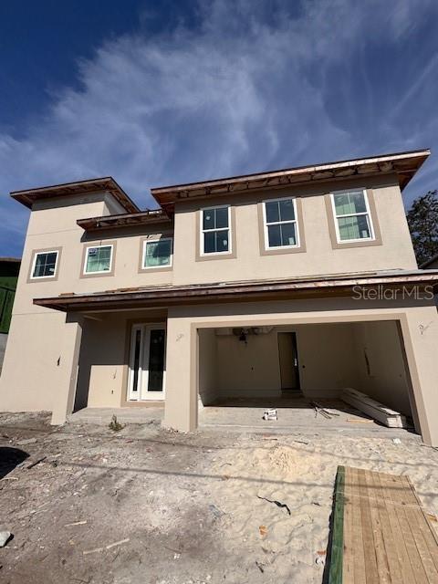 view of front of home featuring a garage