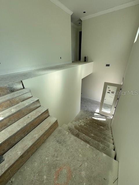 staircase with ornamental molding