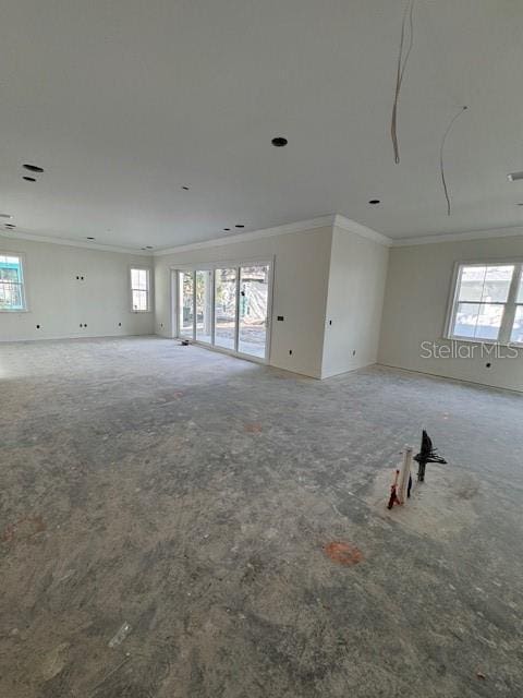 unfurnished room featuring ornamental molding