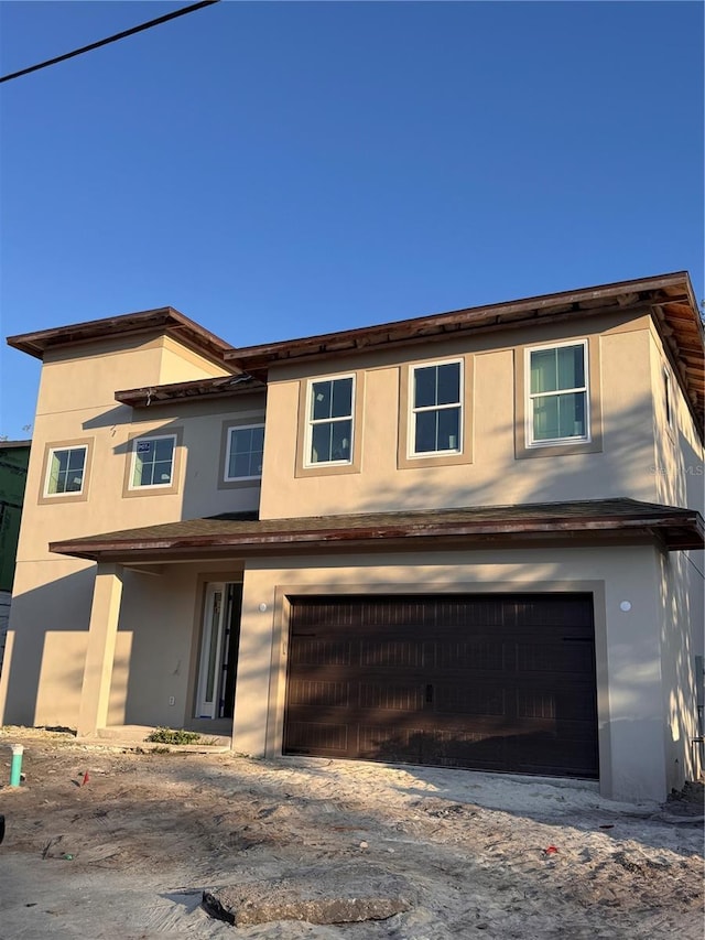 view of front of property featuring a garage