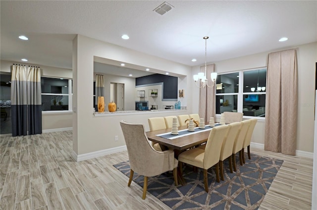 dining space featuring a chandelier