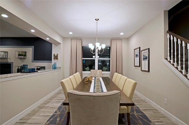 dining space featuring a chandelier