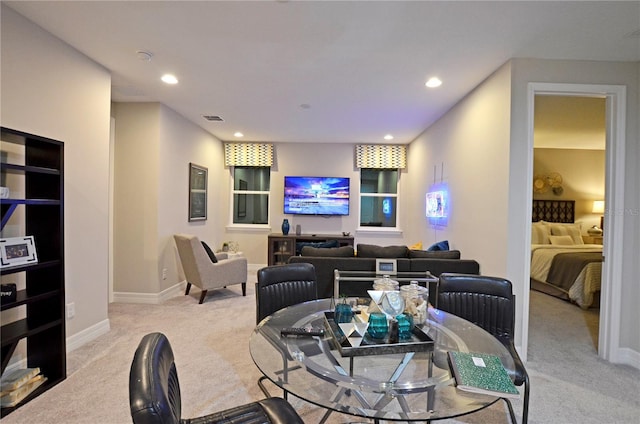 view of carpeted dining area