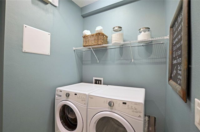 washroom with washer and clothes dryer