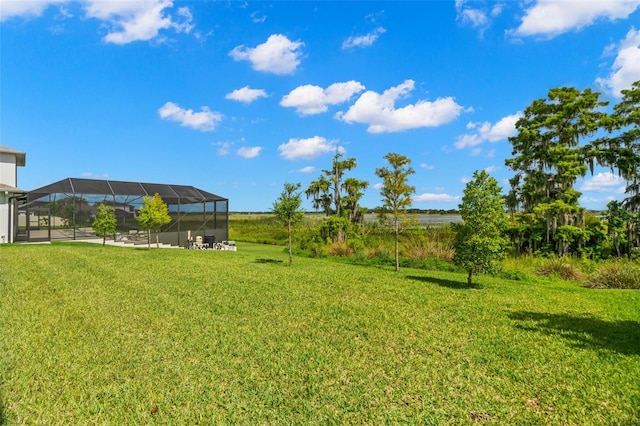 view of yard featuring glass enclosure