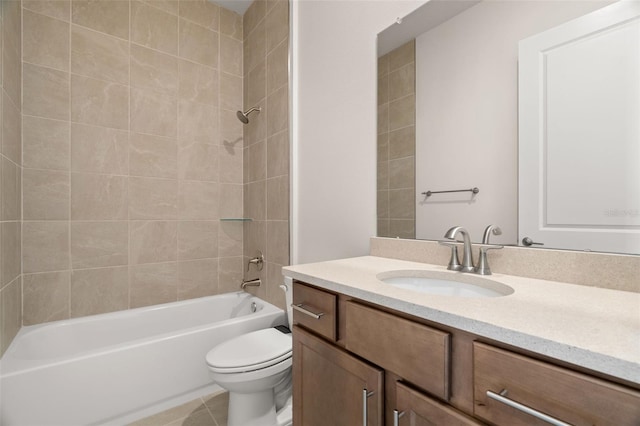 full bathroom featuring toilet, tile patterned flooring, washtub / shower combination, and vanity